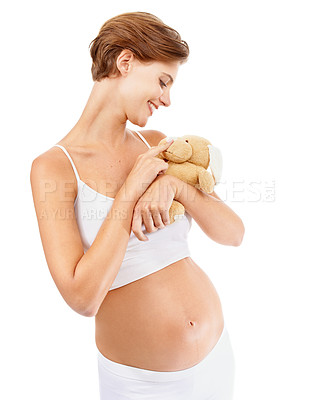 Buy stock photo Pregnant woman, teddy bear and happy pregnancy stomach with a mother excited about motherhood. Child toy, mothers love and mama happiness with a mom smile looking at rabbit doll for children
