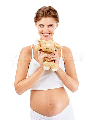 Buy stock photo Pregnancy portrait, woman and teddy bear of a mother happy about pregnant stomach and baby toy. Excited, love and mama smile with children doll ready for motherhood, family and loving parent care