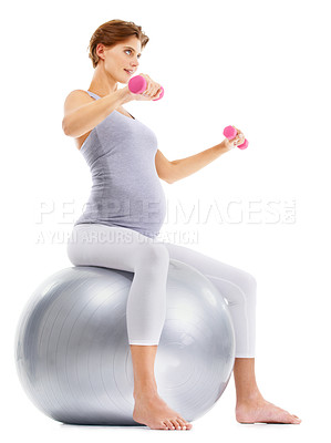 Buy stock photo Fitness, weightlifting and pregnant woman on gym ball for maternity wellness, healthy lifestyle and wellbeing. Sports, pregnancy and female for workout, exercise and pilates with dumbbells in studio