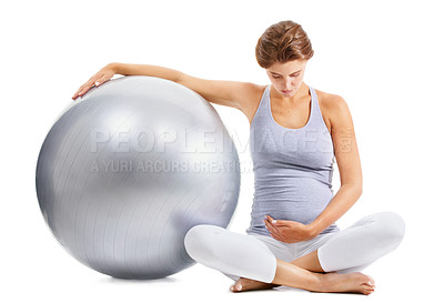 Buy stock photo Pregnant mother, stomach and exercise ball with white background for fitness, pilates and wellness. Pregnancy, medicine ball and woman workout in studio for healthy body, yoga training and energy