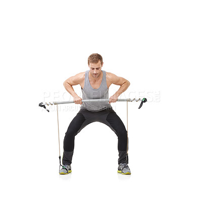 Buy stock photo Fitness, workout and resistance band with a strong man in studio isolated on a white background for health. Gym, exercise or performance and a young athlete training with equipment for wellness
