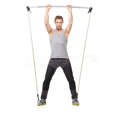 Buy stock photo A young exercising using a resistance band