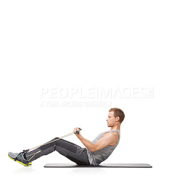 Buy stock photo A young man doing some resistance training