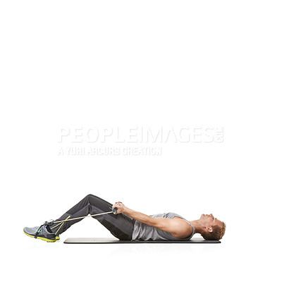 Buy stock photo Exercise, man and resistance band with training, stretching and healthy isolated on white studio background. Mockup space, person and model with workout, wellness or progress with energy or endurance