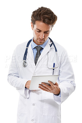Buy stock photo Man, doctor and tablet in studio for healthcare research, online planning or telehealth schedule. Professional medical worker typing, scroll or reading for digital tech for email on white background