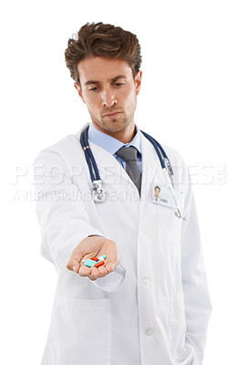 Buy stock photo Doctor, man and prescription of pills in studio, wellness medication and healthcare in pharmaceuticals. Pharmacist, face and serious in medicine support, advice tablets and drugs by white background