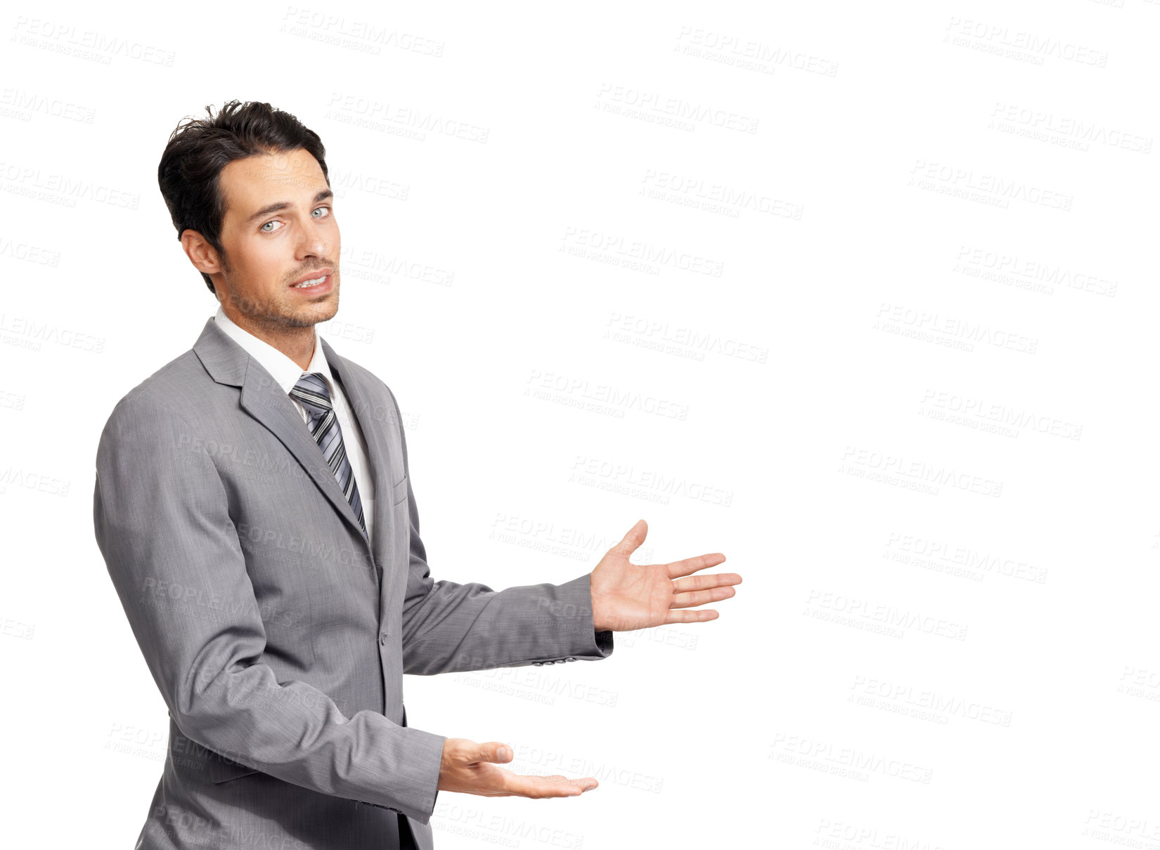 Buy stock photo A nervous young businessman gesturing towards copyspace while isolated on a white background