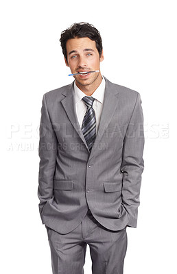 Buy stock photo Portrait, business and suit with a young man, hands in pockets, in studio isolated on a white background. Corporate, professional or formal and a model employee at a company with a pen in his mouth