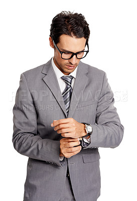 Buy stock photo Formal, business and man adjust suit with fashion, style or watch on wrist in white background of studio. Serious, businessman and professional entrepreneur with care and pride in appearance in work