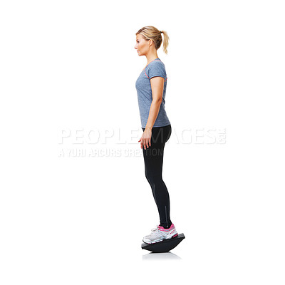 Buy stock photo Balance board, fitness and woman with exercise, wellness and girl isolated on a white studio background. Profile, person and model with equipment, mockup space and healthy with training and workout