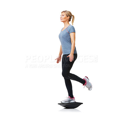 Buy stock photo Balance board, workout and woman with training, exercise and wellness isolated on white studio background. Person, mockup space and model with equipment, fitness and progress with challenge or health