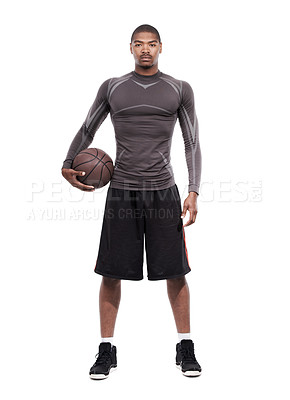 Buy stock photo Portrait of a handsome young basketball player standing in the studio