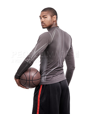 Buy stock photo Portrait of a handsome young basketball player standing in the studio