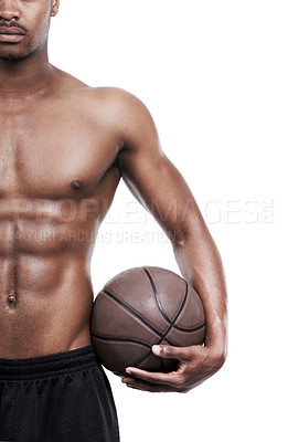 Buy stock photo Cropped shot of a basketball player standing shirtless in the studio