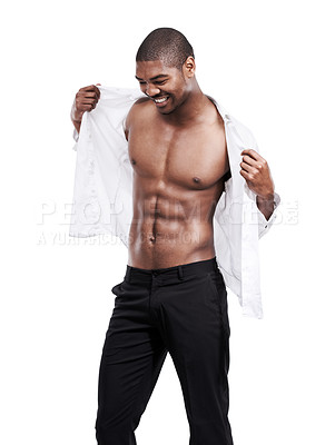 Buy stock photo Man, fashion and muscle with six pack, fit and dressing for chest, african and male model in white background. Alone, smile and happy with muscles, shirt and corporate wear, stylish and masculine
