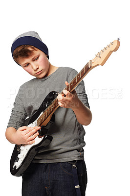 Buy stock photo Teenager boy, guitar player and studio for performance, rock music or concert by white background. Creative person, artist kid or child musician with instrument for art, song and band with fashion
