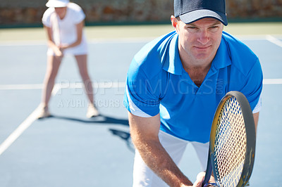 Buy stock photo A mixed doubles team standing ready to receive a serve - Tennis