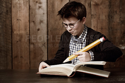 Buy stock photo Education, book and young child writing information, youth development study or problem solving homework solution. stationery, textbook and scholarship kid, boy or student thinking of academic answer
