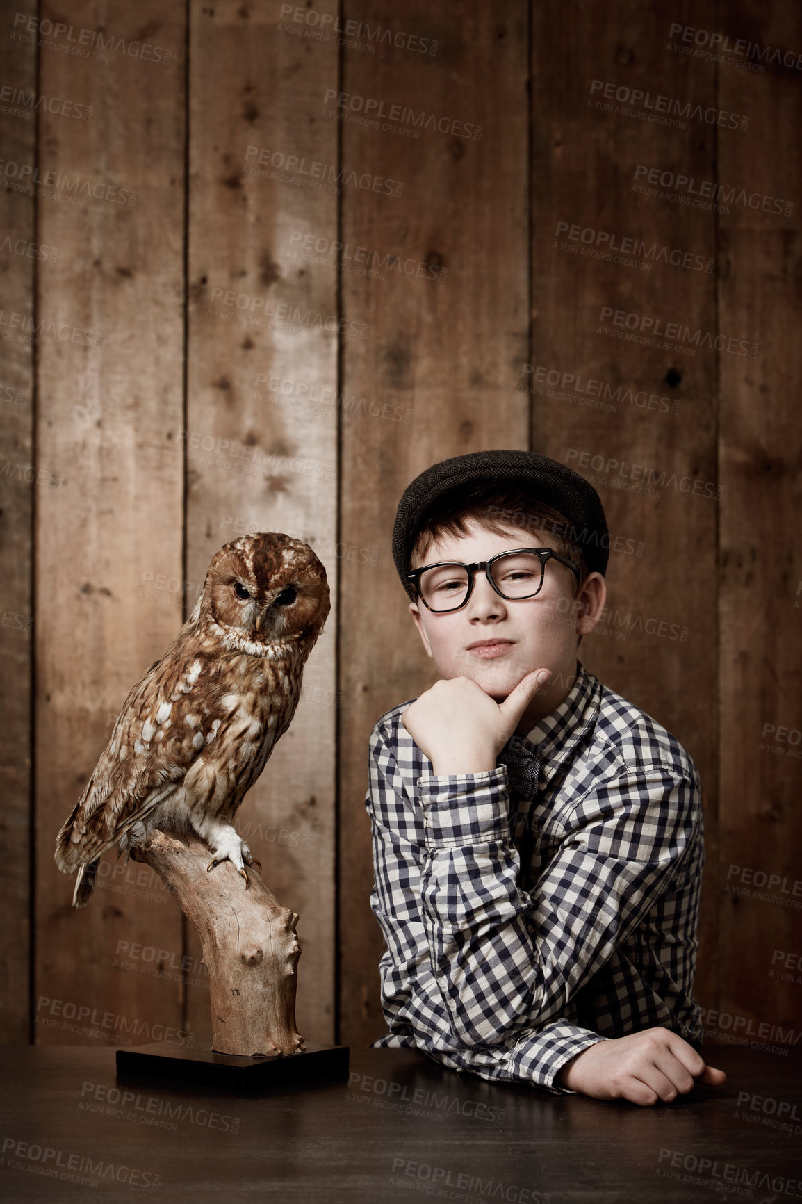 Buy stock photo Young child, portrait and confident with thinking by owl, pride and vintage fashion with glasses in mockup. Boy, face and nerd with wise bird in retro clothes with eyewear, contemplation and smart
