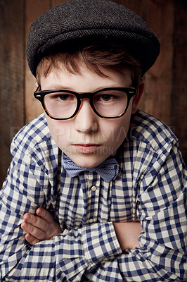Buy stock photo Portrait, glasses and serious kid with arms crossed for fashion, retro or vintage. Confident face, nerd and young boy child in hat, geek in stylish eyewear and trendy casual clothes in New Zealand