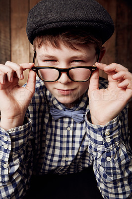 Buy stock photo Young child, portrait and glasses with thinking in mockup, pensive and vintage fashion with eyesight. Boy, face or geek in thought in retro clothes with eyewear, contemplation or smart kid for vision