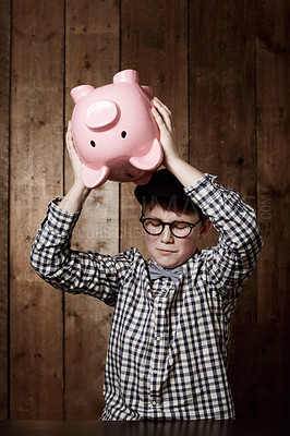 Buy stock photo Piggy bank, smash and sad boy child with investment, growth or savings fail at home. Economy, inflation and unhappy kid with money, box or cash container for emergency payment, loan or empty account