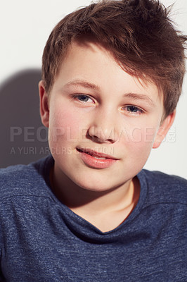 Buy stock photo Teenager, thinking and face of boy in studio, white background or dream of future with vision. Kid, relax and wonder with inspiration or confident child with a smile and insight in mock up space