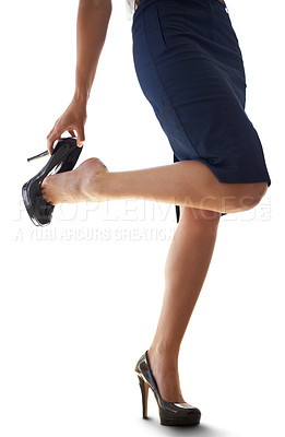 Buy stock photo Closeup of a businesswoman putting on a pair of heels