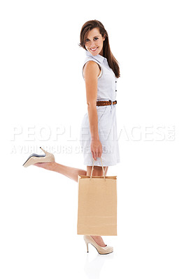 Buy stock photo Woman, high heels and studio portrait with shopping bag for style, sale or feet by white background. Girl, person and shoes in mockup space, clothes and discount with retail deal, product and fashion