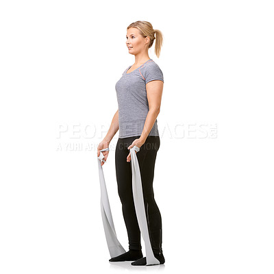 Buy stock photo Health, resistance band and woman doing exercise in studio for fitness, wellness and bodycare. Sports, full length and young female person from Canada with arm workout or training by white background