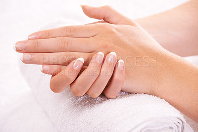 Buy stock photo Woman, hands and french manicure in spa, salon and cosmetic care, skincare and beauty. Natural tips, wellness and treatment for hygiene, closeup and nail parlour with towel, clean and maintenance