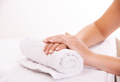 Buy stock photo Woman, hands and french manicure in beauty salon, spa and cosmetic care, skincare and tips. Natural growth, luxury and treatment for hygiene, closeup and nail parlour with towel, clean or maintenance