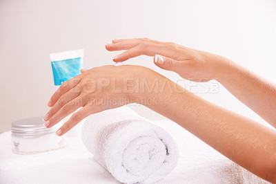 Buy stock photo Skincare, lotion and hands closeup in spa, touch and massage for wellness. Fingers, nails and woman apply cream in treatment, natural cosmetics or dermatology moisturizer, beauty health or manicure