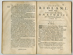 Worn old book pages of a Latin textbook
