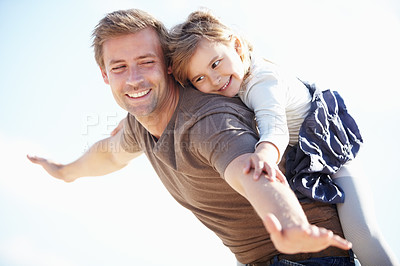 Buy stock photo Happy, airplane and father with child in nature playing, having fun and bonding together. Smile, love and young dad carrying girl kid from Canada on back for playful freedom with sky in a park.
