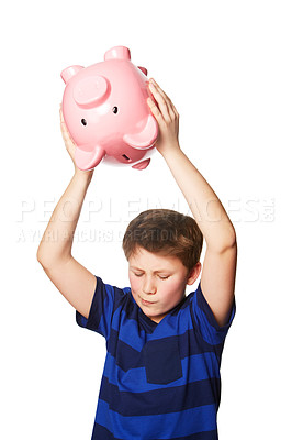 Buy stock photo Piggy bank, smash and young boy in studio for finance, savings and decision against white background. Money box, breaking and preteen male person with investment, cash and future financial freedom 