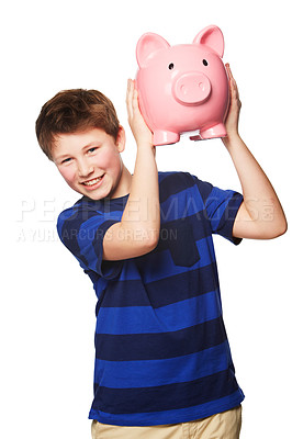 Buy stock photo Portrait of a young boy holding his piggybank