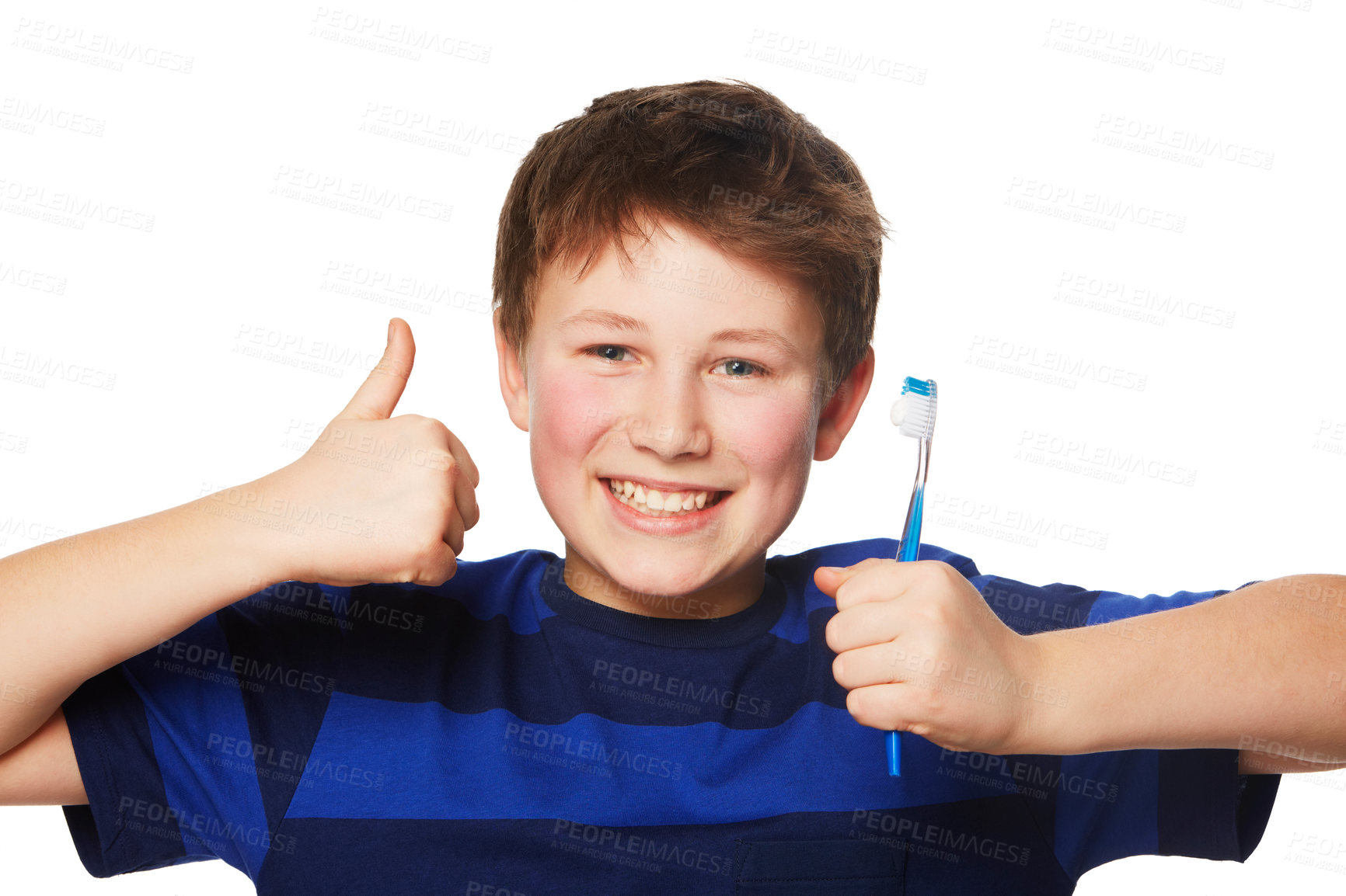 Buy stock photo Portrait of a young boy holding is toothbrush and giving a thumbs up