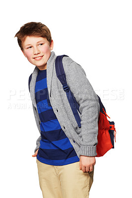 Buy stock photo A young boy standing with his hands in his pockets