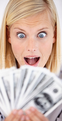 Buy stock photo Excited, woman wow and money with dollars, investment and savings for budget with reward. Wealth, wondering and happy person smile with cash profit from work bonus in studio with white background
