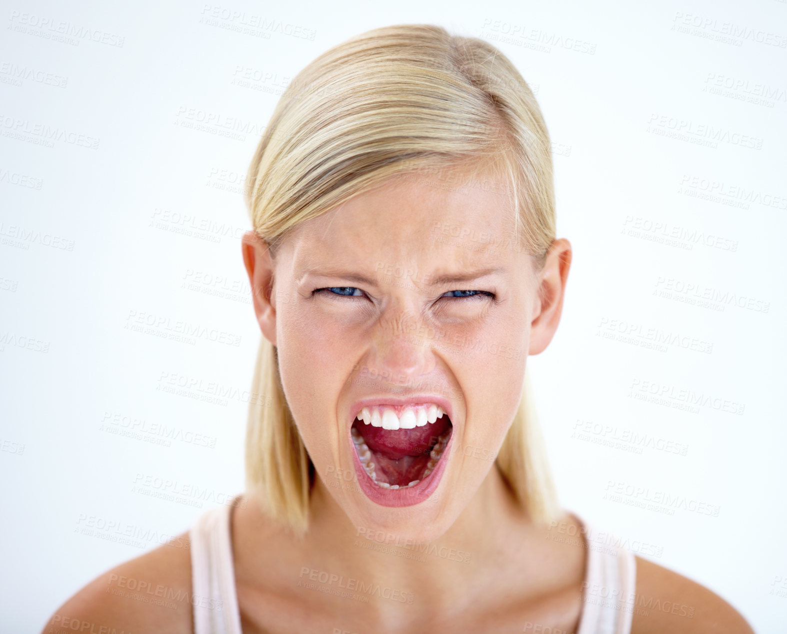 Buy stock photo Head and shoulders portrait of a furious woman screaming loudly