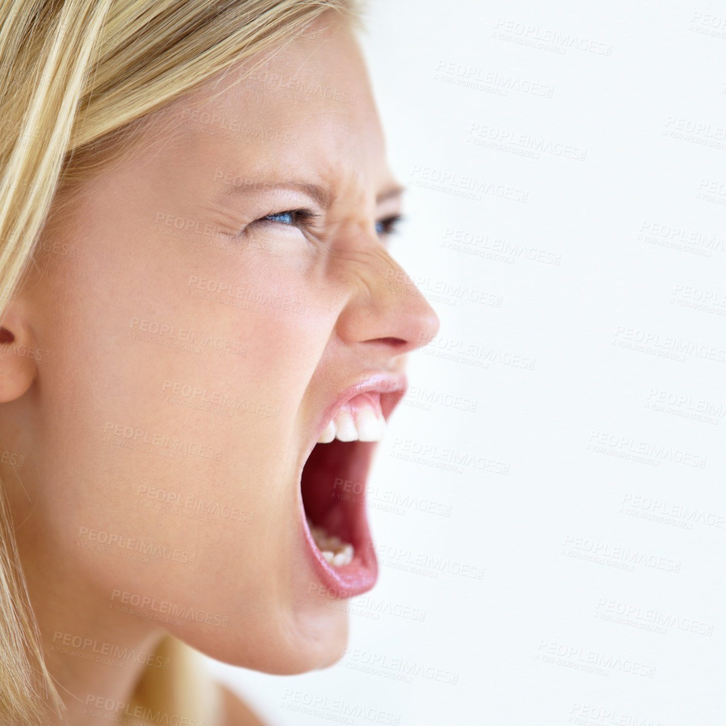 Buy stock photo Angry, face or woman screaming in studio at mockup space for crisis, mad emoji or reaction on white background. Frustrated model, shouting or voice of anger, emotional conflict or negative expression