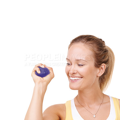 Buy stock photo Stress ball, health and woman in studio for smile, fitness and arm exercise with wellness. Happy, sport equipment and young female person from Canada with anxiety relief isolated by white background.