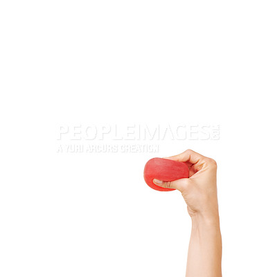 Buy stock photo Cropped view of a woman's hand squeezing a stress ball against a white background