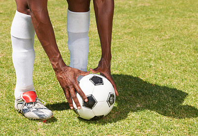 Buy stock photo Hands, soccer ball and person on grass for penalty, free kick or shootout for competition in summer. Football, sports and position for shooting, strategy and location on pitch for goal opportunity