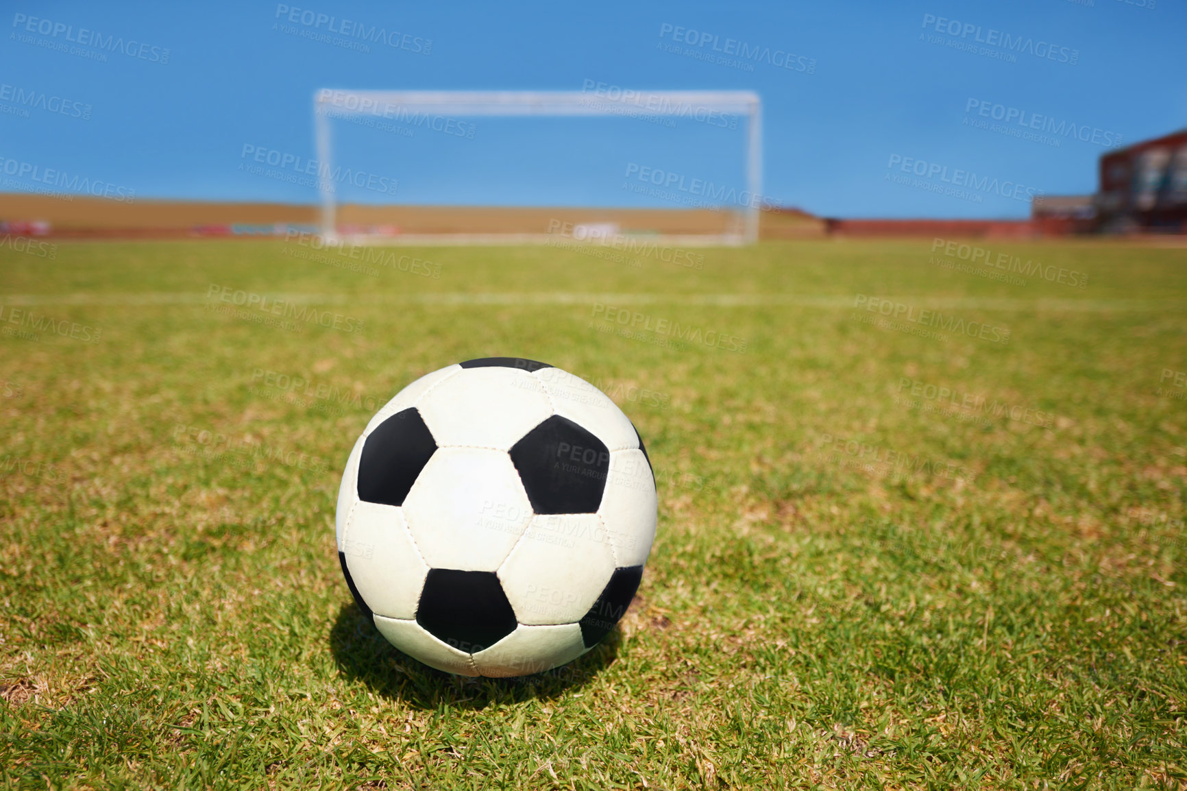 Buy stock photo Soccer ball, empty field and goal on ground for shooting, free kick and competition for sports in summer. Football, grass or pitch by net, frame or sunshine for training, exercise or workout in game