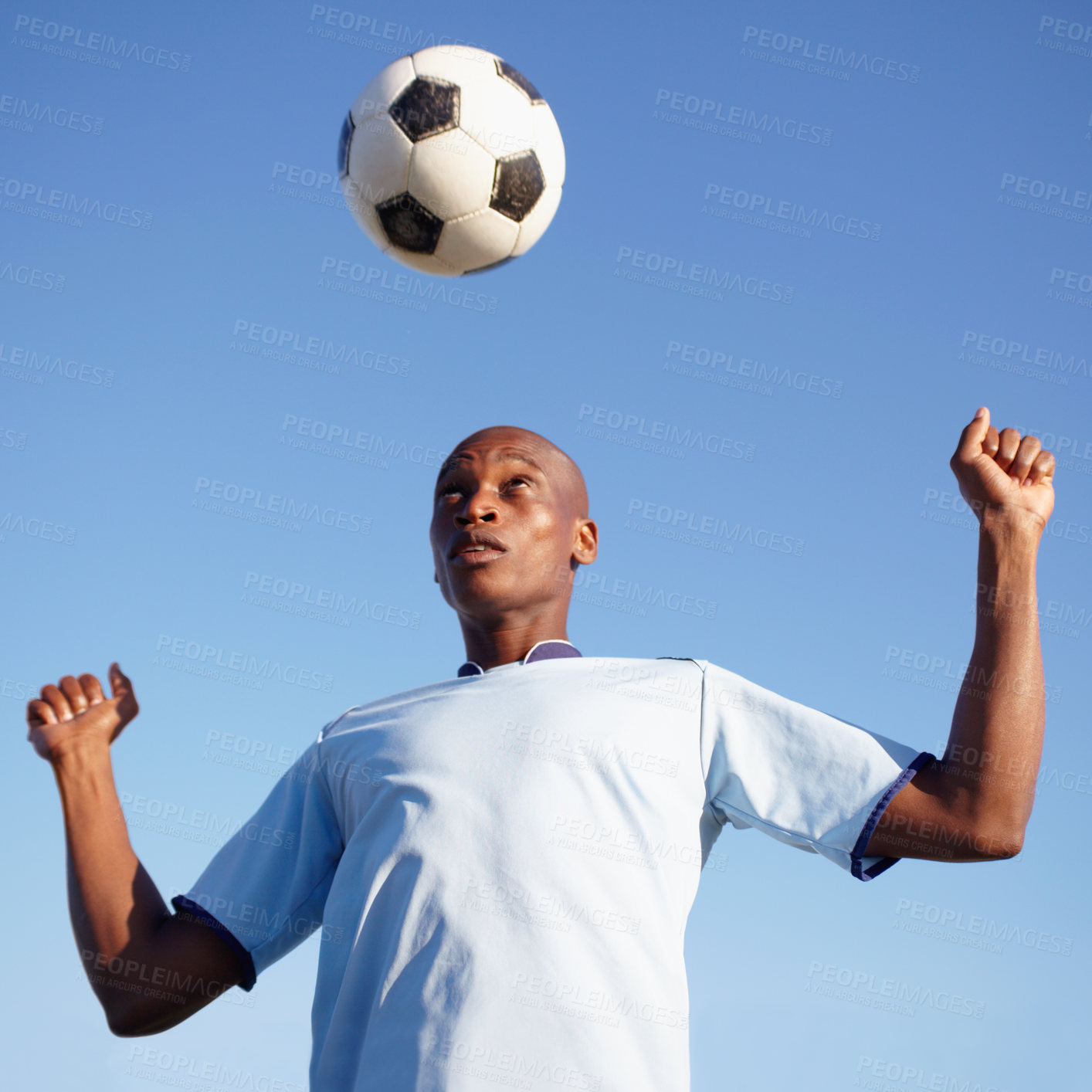 Buy stock photo Man, training and header with soccer ball, power or defender with vision, strategy or workout by sky background. African football player, control and workout in game, contest or competition in summer