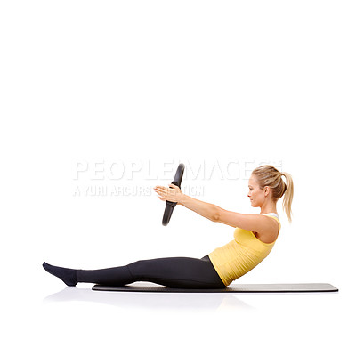 Buy stock photo Pilates ring, fitness and woman exercise in studio isolated on a white background mockup space. Training, person on mat and magic circle for roll up, strong abdomen and healthy body workout on floor