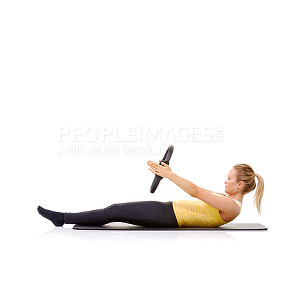 Buy stock photo Pilates ring, fitness and woman exercise in studio isolated on a white background mockup space. Training, person on mat and magic circle for crunches, strong abdomen and healthy body workout on floor