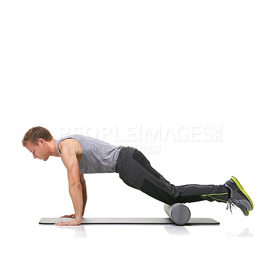 Buy stock photo Exercise, foam roller and man in floor push up for arm strength building, muscle growth or bodybuilding workout. Balance, mockup studio space or sports person in pilates training on white background